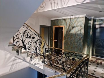 Masterpiece Villa With A Private Pool, Sauna & Garden For Sale in Belek - Landing and intricate staircase