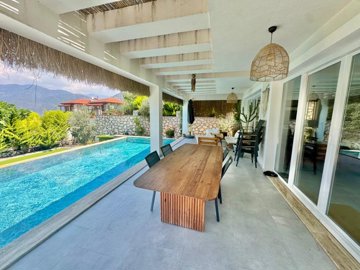 Upscale Detached Villa In Fethiye For Sale - Spacious covered terrace looking over the pool and out to the natural surroundings