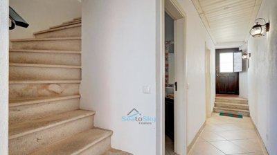 stairs to living room and kitchen